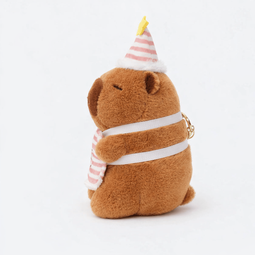 Pluschtierland Capybara Kuscheltier mit Partyhut & Schürze Capybara Kuscheltier mit Partyhut & Schürze