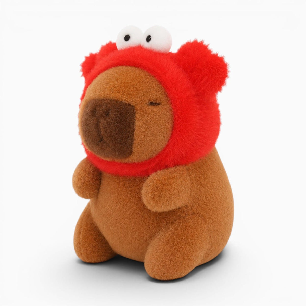 Pluschtierland Capybara Kuscheltier mit Roter Krabbenmütze Capybara Kuscheltier mit Roter Krabbenmütze