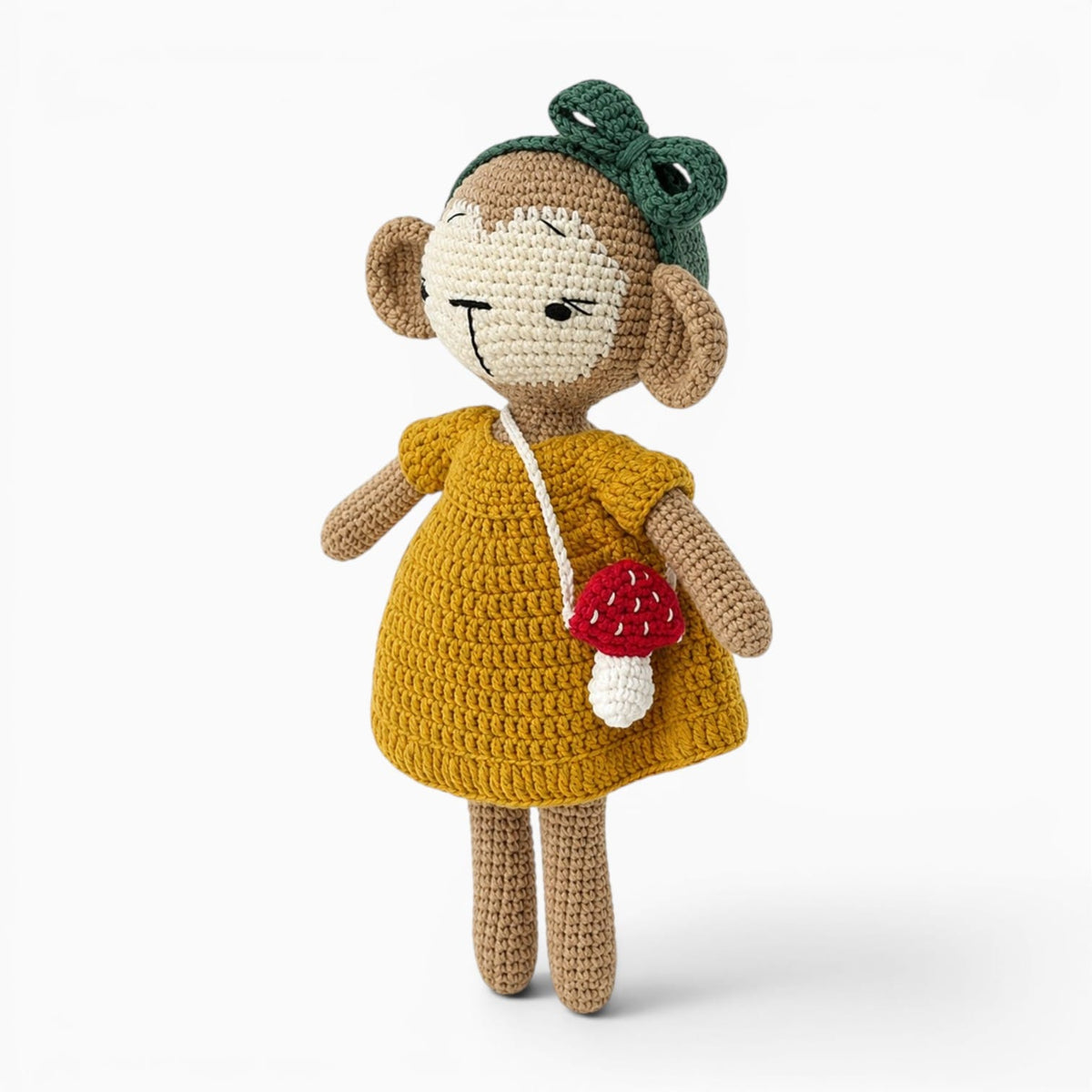 Pluschtierland Gehäkeltes Affen Kuscheltier im gelben Kleid Gehäkeltes Affen Kuscheltier im gelben Kleid